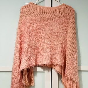 Knit fringe poncho style coat, one size fits most.